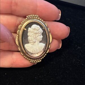 Elegant Gold and Black Cameo Brooch